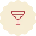 Red icon on a cream-colored background, representing a coupe glass.